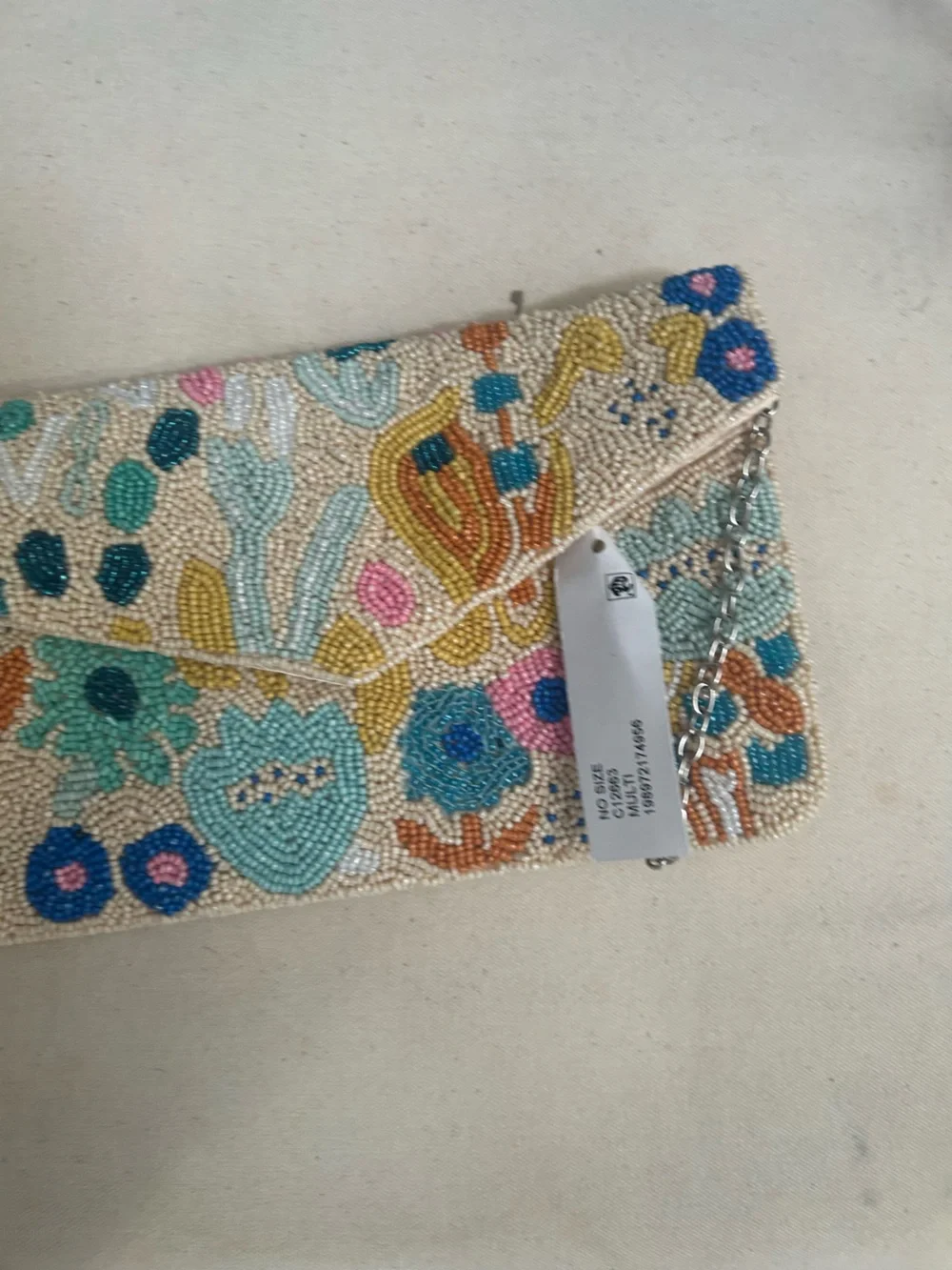 NWT SOL and MER beaded clutch.